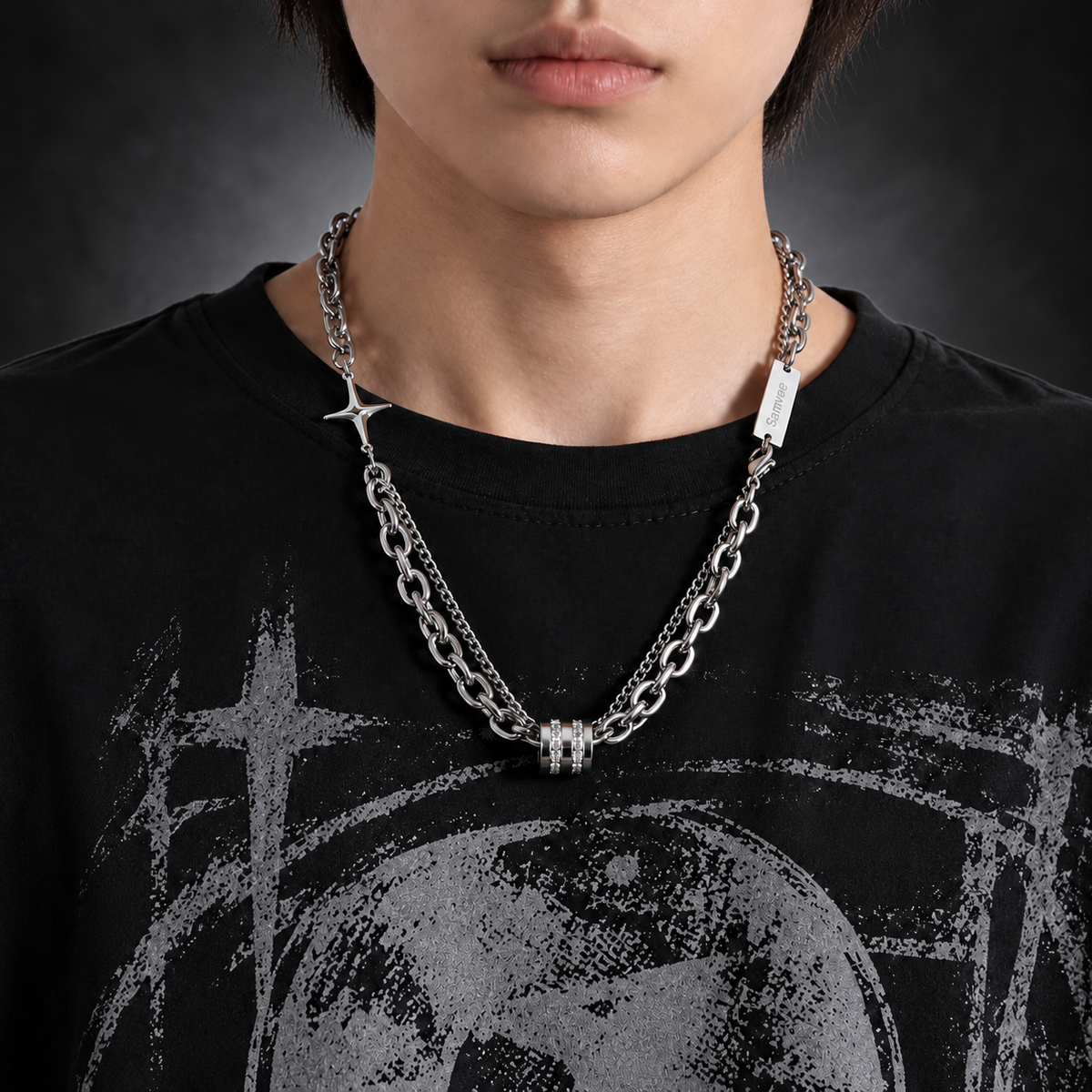 Model wearing Samvee men's layered silver Double Cross and Lucky Bead necklace