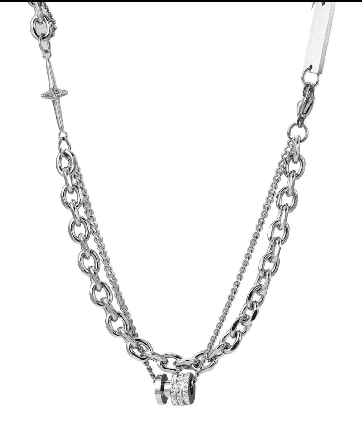 Close-up of Samvee Double Cross and Lucky Bead necklace details